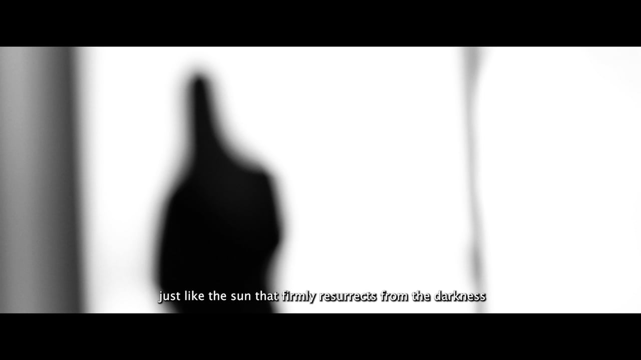 Monochrome film still from the Paramour trailer with a silhouetted figure