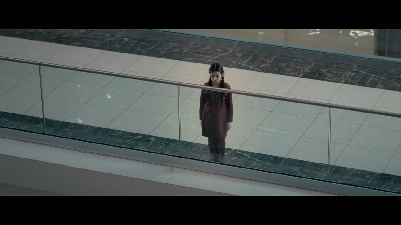 Wide architectural film still from the Witness trailer